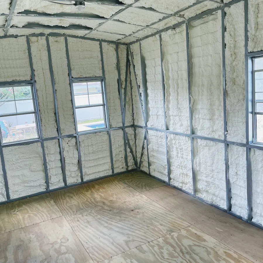 Closed-cell spray foam insulation applied to wall cavities in a residential project in Richmond